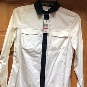 White with navy blue collar and cuff